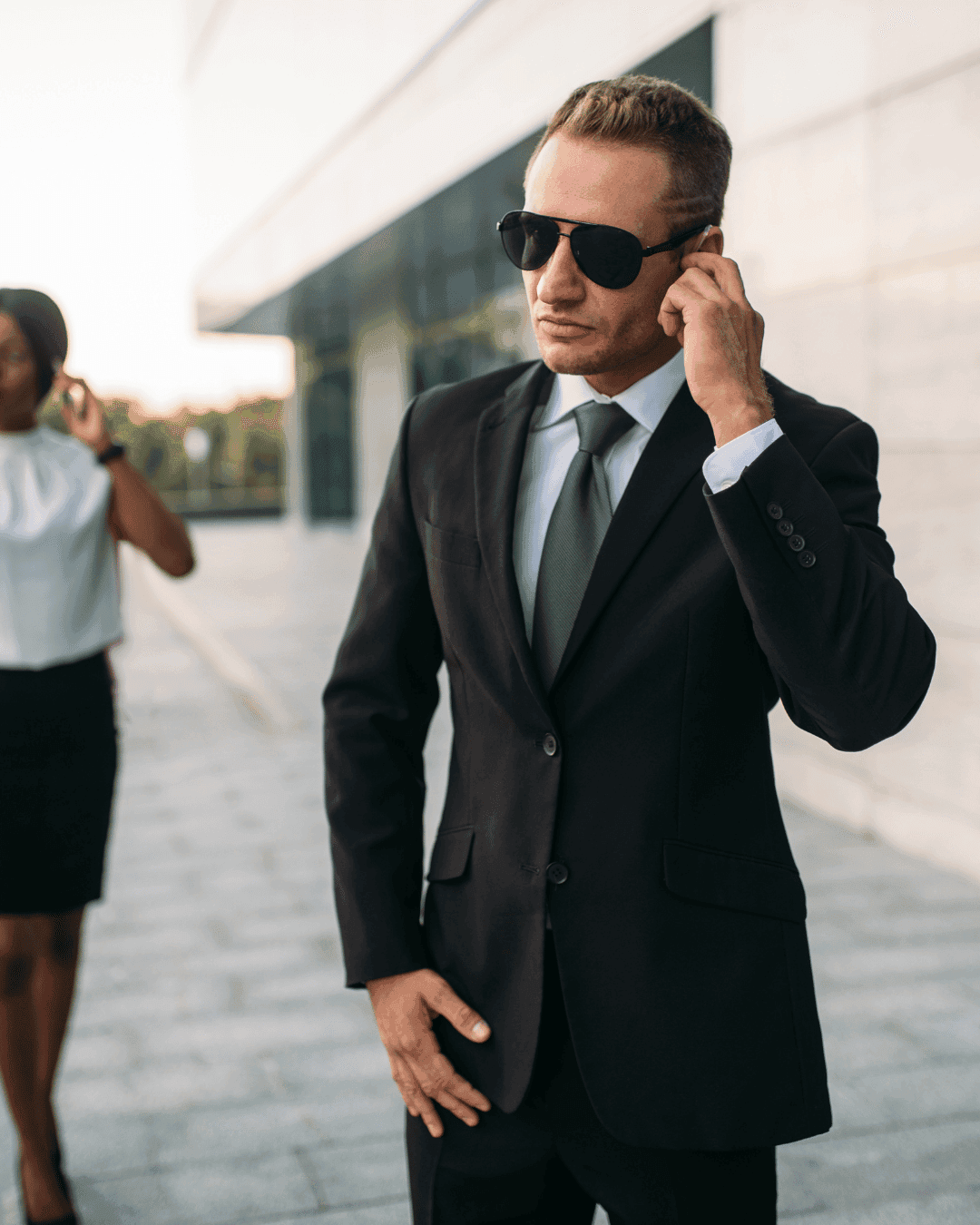 Professional close protection officer providing executive security